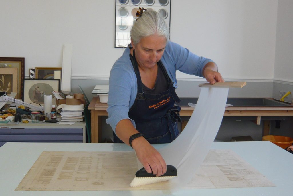 Emily at the studio bench
